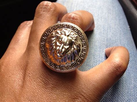 lion ring versace|Versace lion heads.